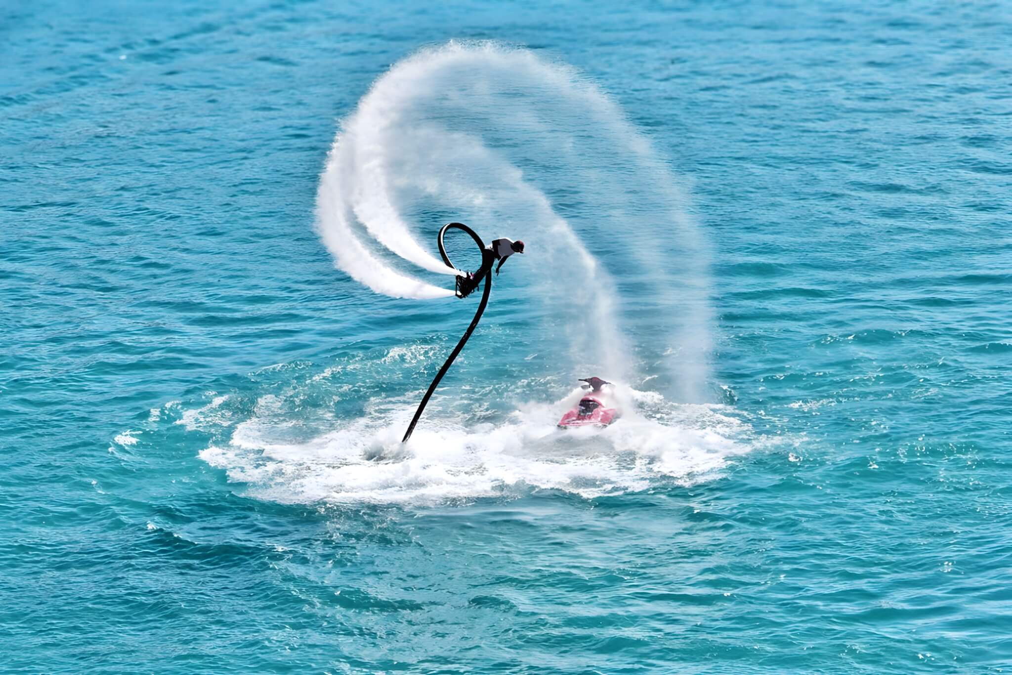 Flyboarder hovering above the water in Dubai