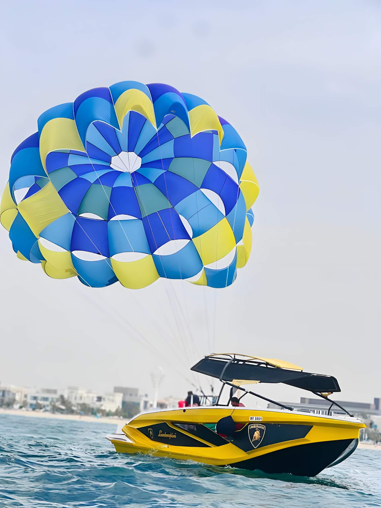 Parasail high above the Arabian Gulf along the UAE coastline
