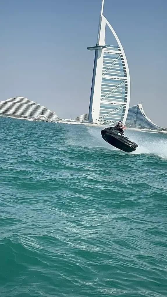 Jet ski airborne in front of the Burj Al Arab in Dubai